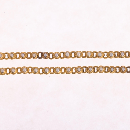 1122 - A 22ct gold pearl line bracelet, set with split pearls, apparently unmarked and tests as 22ct, 16cm,... 