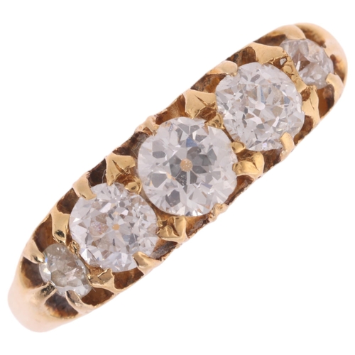 1131 - An 18ct gold graduated five stone diamond half hoop ring, set with old-cut diamonds, total diamond c... 