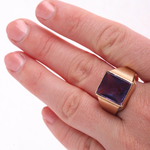 1132 - A 14ct gold synthetic sapphire signet ring, rub-over set with rectangular flat-top synthetic sapphir... 