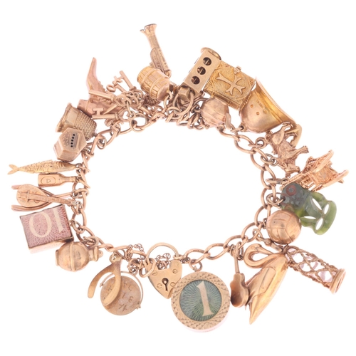 1134 - A 9ct rose gold curb link charm bracelet, with various 9ct gold charms, including swan, green stone ... 