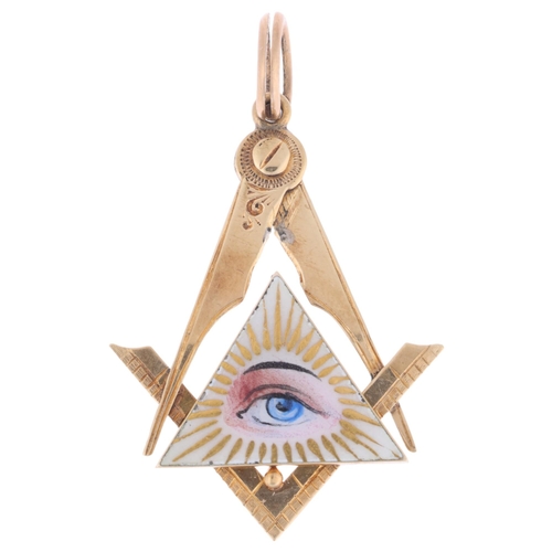 1135 - An Antique 9ct gold enamel Masonic eye pendant, hand painted and gilded enamel panel, apparently unm... 