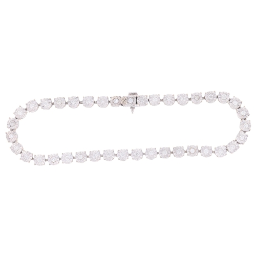 1141 - A 14ct white gold diamond tennis line bracelet, illusion set with modern round brilliant-cut diamond... 