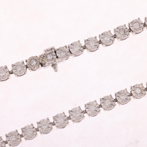 1141 - A 14ct white gold diamond tennis line bracelet, illusion set with modern round brilliant-cut diamond... 