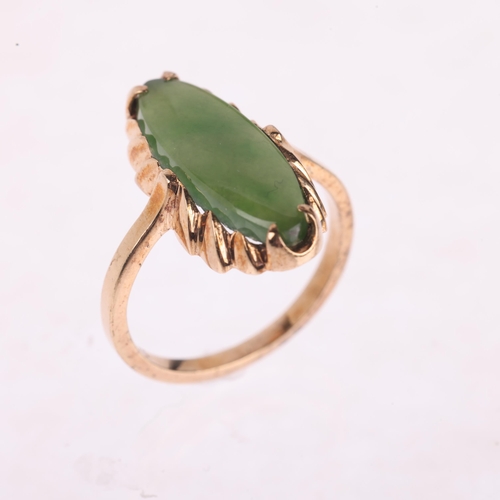 1143 - A 9ct gold jadeite panel ring, set with marquise cabochon jade, setting height 20.5mm, size M, 2.7g