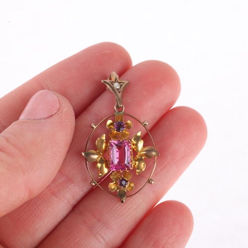 1145 - An Art Nouveau Edwardian 9ct gold pink paste amethyst and pearl floral openwork pendant, maker W Bro... 