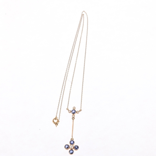 1146 - An Edwardian 15ct gold sapphire and split pearl drop pendant necklace, circa 1905, millegrain set wi... 