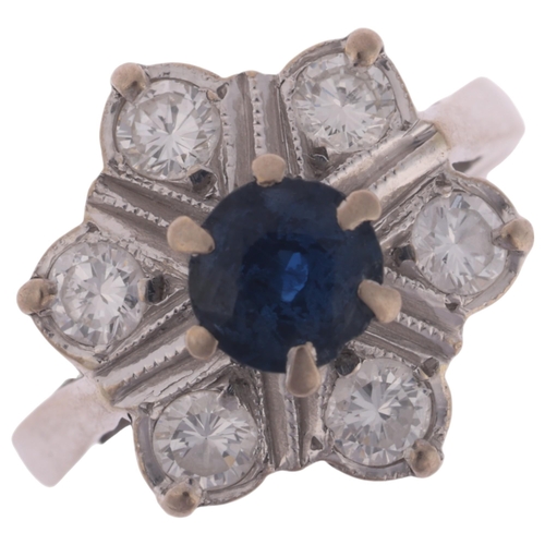 1147 - An 18ct white gold sapphire and diamond flowerhead cluster ring, set with round-cut sapphire and mod... 