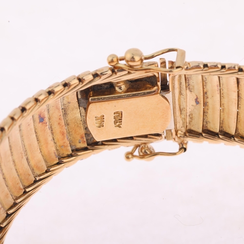 1149 - An Italian 14ct gold bracelet, of overlapping lobed link design, with polished and textured decorati... 