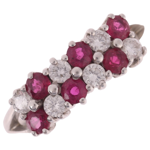 1152 - An 18ct white gold ruby and diamond double-row half hoop ring, claw set with round-cut rubies and mo... 