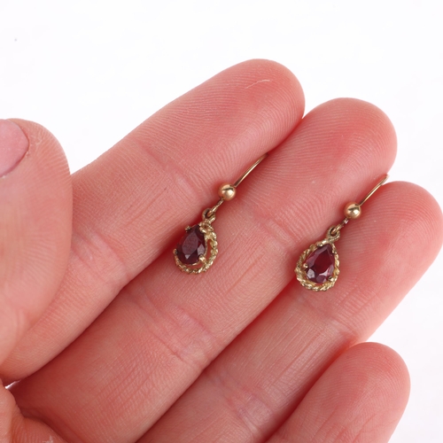 1153 - A pair of 9ct gold garnet drop earrings, set with pear-cut garnets, with kidney wire hook fittings, ... 