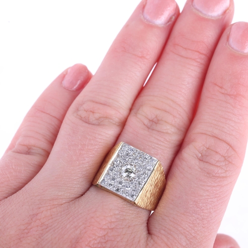 1155 - An 18ct gold diamond signet ring, pave set with old European and eight-cut diamonds, total diamond c... 