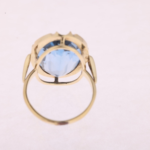 1167 - A 14ct gold blue topaz dress ring, set with oval rose-cut blue topaz, setting height 20.2mm, size H/... 