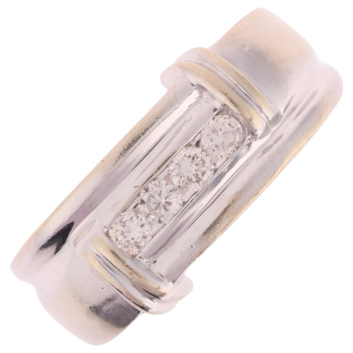 1177 - A 14ct white gold diamond band ring, channel set with modern round brilliant-cut diamonds, total dia... 