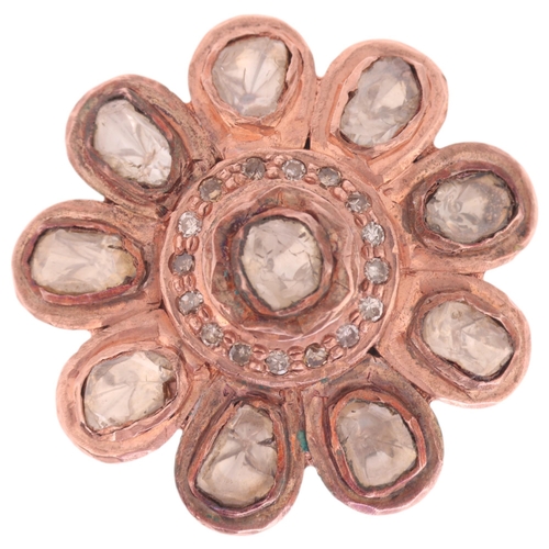 1180 - An Indian Polki diamond flowerhead cluster ring, unmarked mount tests as 14ct rose gold and base met... 