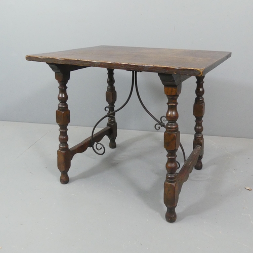 2217 - A 19th century Spanish table in oak with wrought iron stretchers. 72x61x55cm.