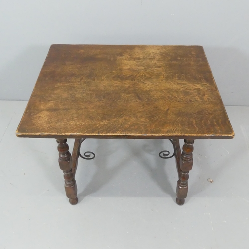 2217 - A 19th century Spanish table in oak with wrought iron stretchers. 72x61x55cm.