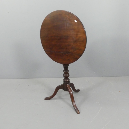 2189 - A 19th century mahogany circular tilt-top occasional table, on turned central column with tripod bas... 