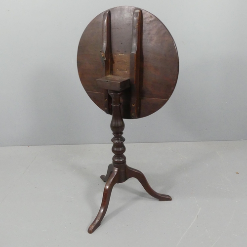 2189 - A 19th century mahogany circular tilt-top occasional table, on turned central column with tripod bas... 