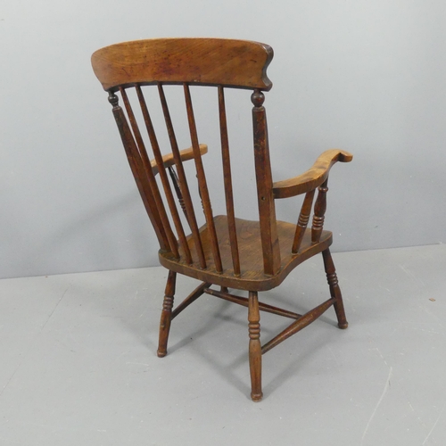 2192 - An elm-seated Windsor kitchen stick-back open armchair.