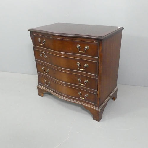 2199 - A reproduction mahogany serpentine-front chest of four drawers on bracket feet. 74x72x45cm.