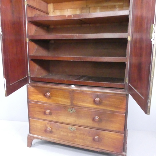 2209 - A 19th century mahogany three-section linen press, the top with a slide fitted interior and the base... 