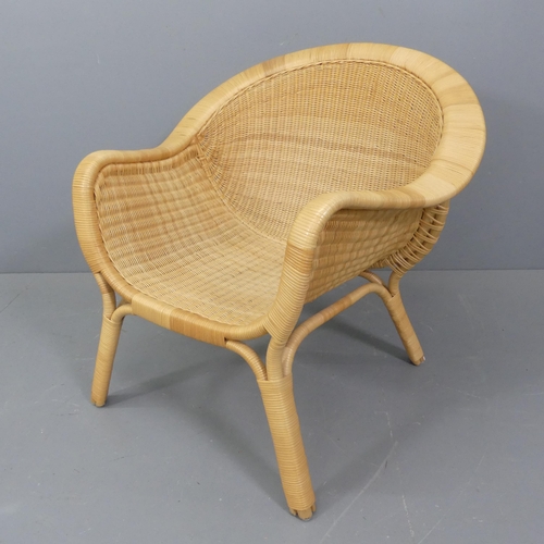 2096 - NANA DITZEL - A mid-century Danish rattan lounge chair , Madame by Sika Design, Denmark, designed in... 