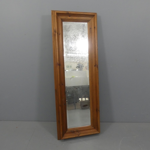 2268 - A modern pine-framed rectangular wall mirror. 52x144cm.