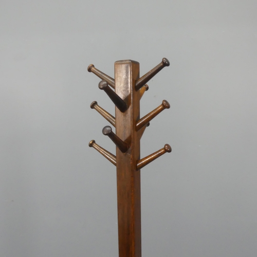 2224 - A mid-century teak hat and coat stand. Height 177cm.