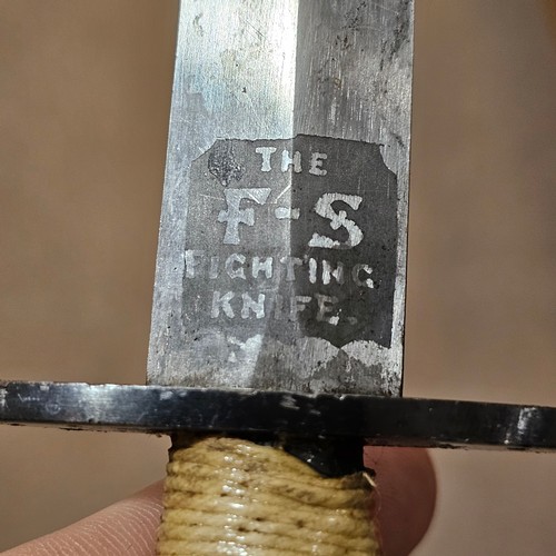 414 - A Fairbairn Sykes Fighting Knife, WW2 era 2nd patten by Wilkinson Sword Ltd, London, etched makers d... 