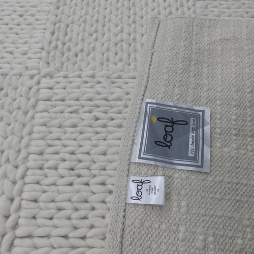 2278 - LOAF - A contemporary hand-made wool  area rug with squares design and maker's labels. 206x98cm.... 