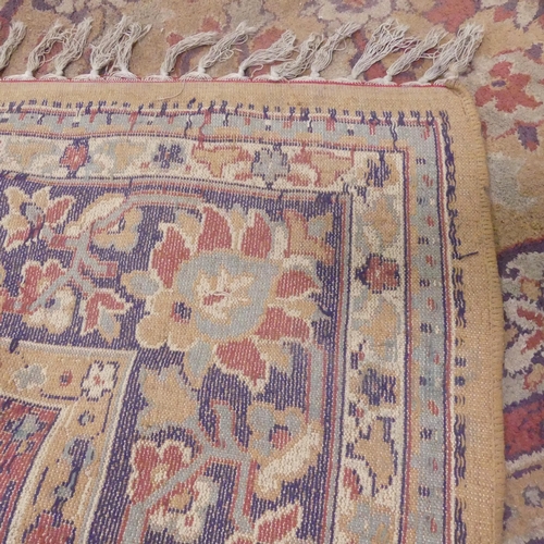 2312 - A Persian carpet. 270x260cm.