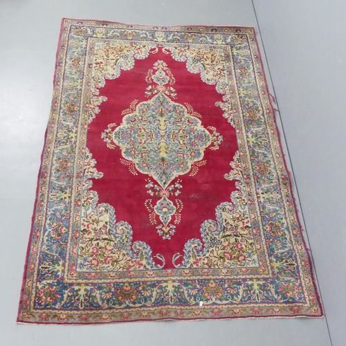 2316 - A cream and red-ground Kashan rug. 223x141cm.