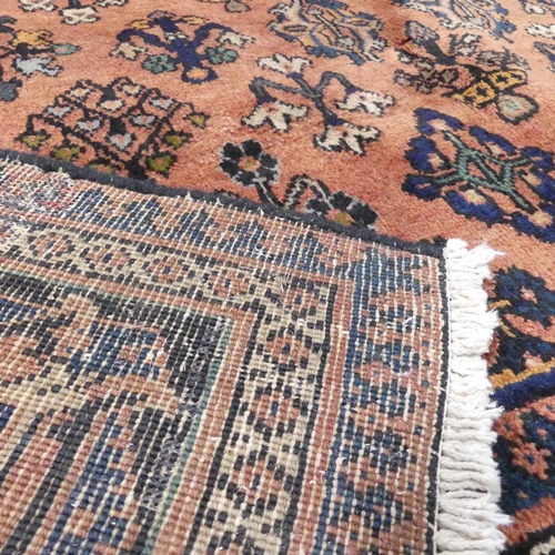 2323 - A blue-ground Joshaghan carpet. 323x212cm.