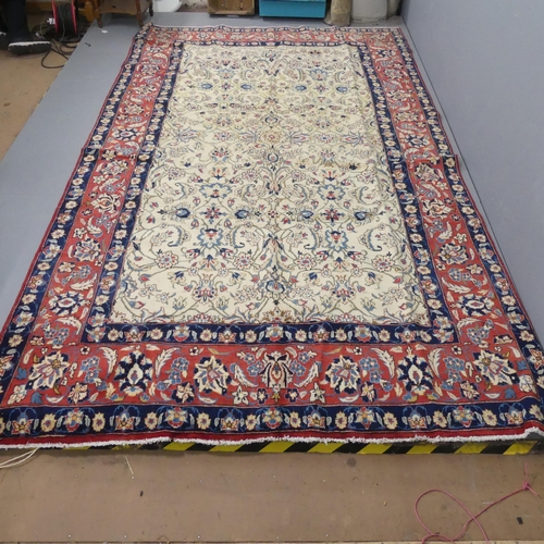 2324 - A red and cream-ground Hamadan carpet. 343x200cm.