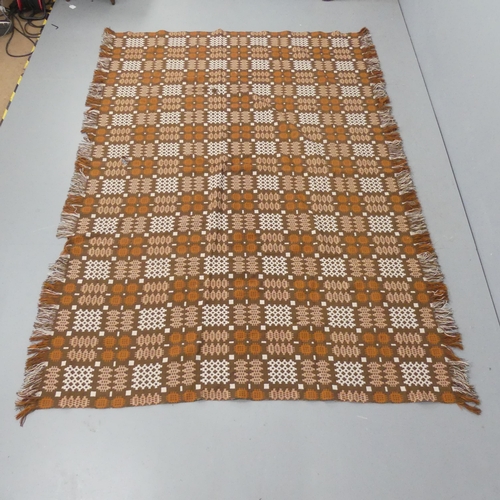 2326 - A Welsh blanket, reversible in brown and cream, with label for Elfed tapestries. 248x160cm.... 