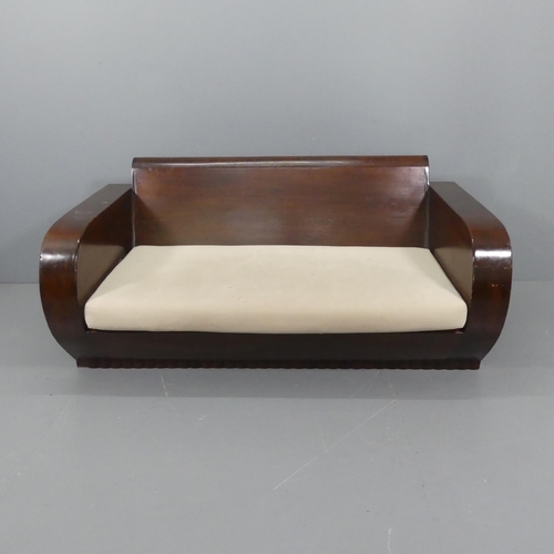 2335 - A French Colonial Art Deco sofa, the armrests with built in cupboards and book shelves. Overall 165x... 