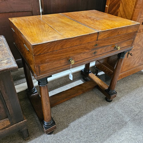 490 - A George III mahogany writing desk, with double fold-out top enclosing a fitted interior, single fri... 