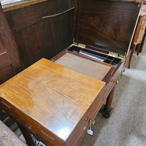 490 - A George III mahogany writing desk, with double fold-out top enclosing a fitted interior, single fri... 