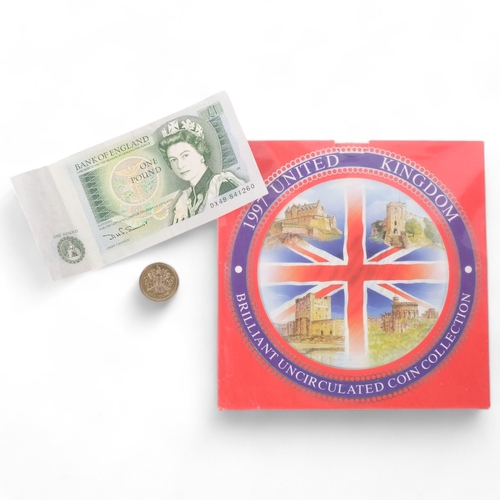 1004 - A 1997 United Kingdom brilliant uncirculated coin collection, Queen Elizabeth II One Pound note and ... 