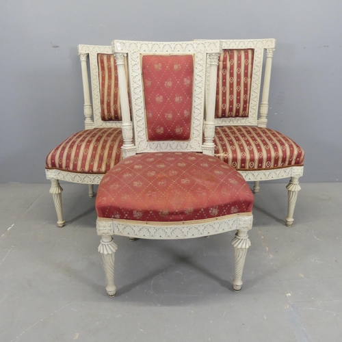 2509 - A set of three French bedroom / side chairs, with carved and painted wooden frames and upholstered s... 