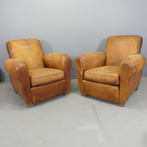 2523 - A pair of French leather-upholstered club arm chairs.