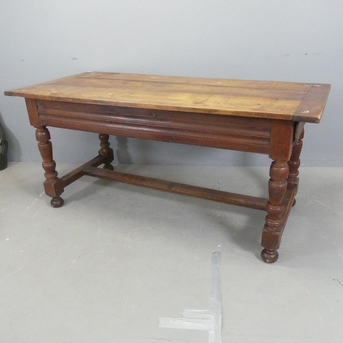 2524 - A French Cherrywood plank-top dining table, with two end-frieze drawers, turned legs and H-shaped st... 