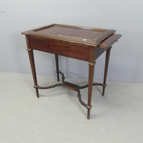 2530 - An early 20th century continental oak writing / side table, with inlaid brass decoration, end slides... 