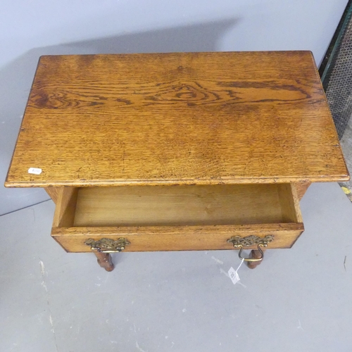 2534 - An 18th century style oak side table, with single drawer and turned legs. 66x72x36cm.