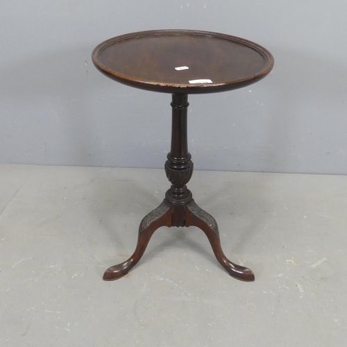 2539 - A reproduction mahogany circular topped occasionally, raised on central column with tripod base and ... 