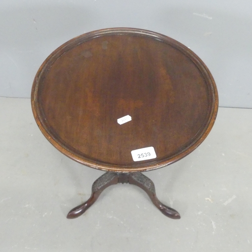 2539 - A reproduction mahogany circular topped occasionally, raised on central column with tripod base and ... 