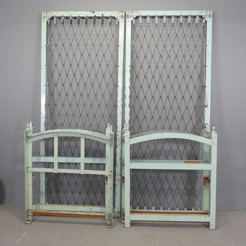 2540 - Two metal frames single beds, believed to have come from and asylum. Can be assembled as standard or... 