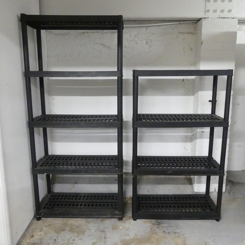 2541 - Two modern plastic modular shelving units, with a total of nine shelves including two bases. Largest... 