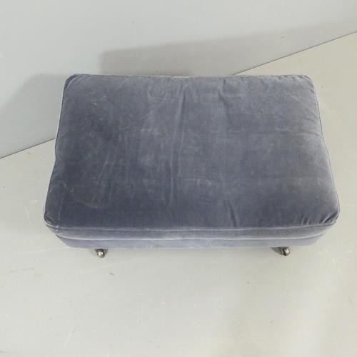 2510 - A contemporary mahogany and upholstered footstool, in the manner of OKA 69x42x45cm.