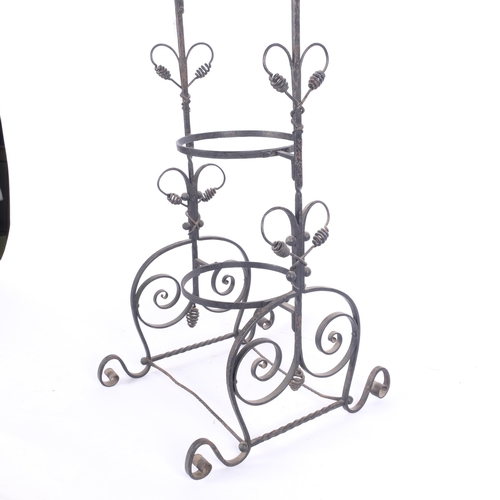 675 - A wrought-iron 3-tier cake stand, lacking plates, H79cm